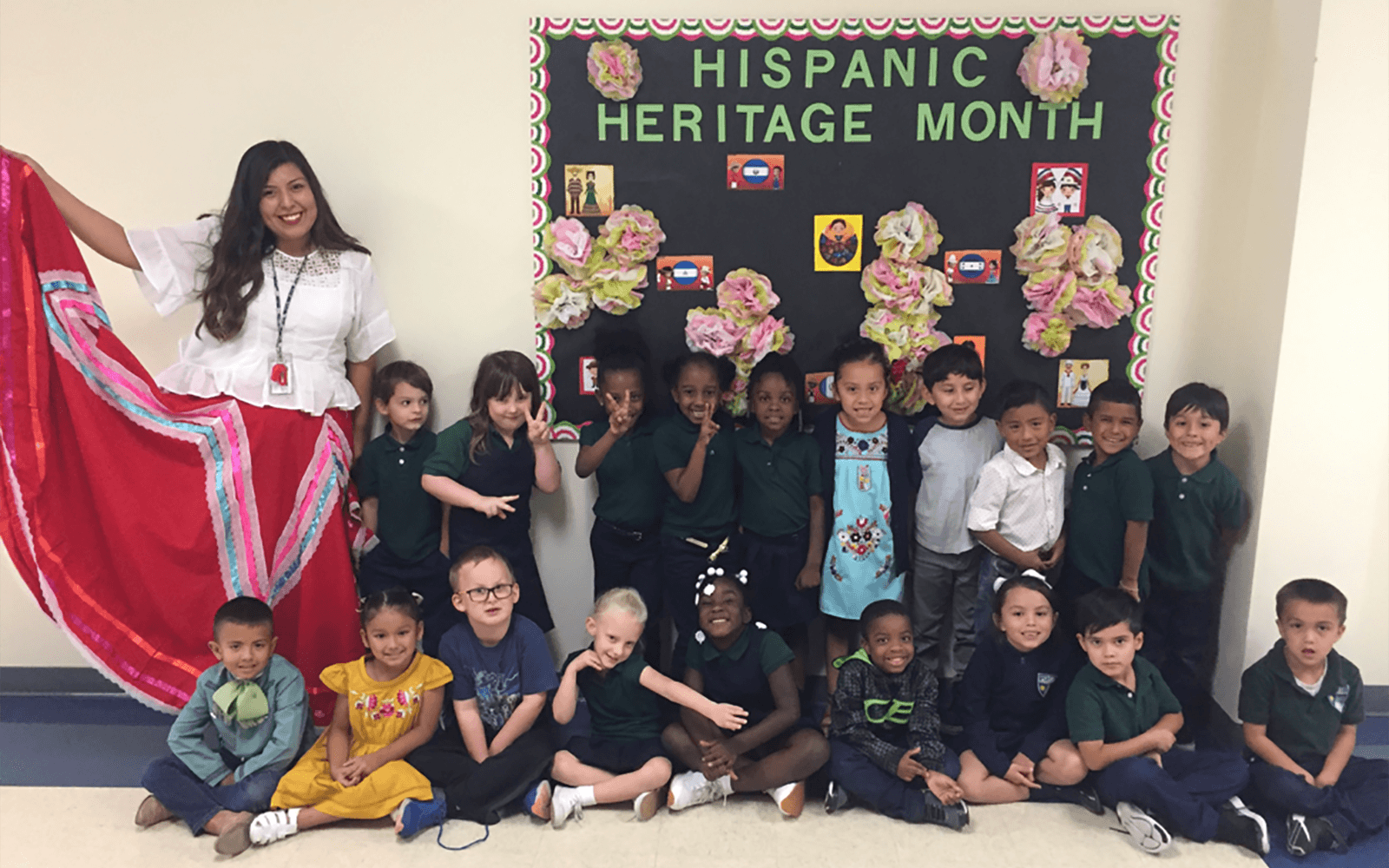 Teacher with students celebrating Hispanic Heritage Month